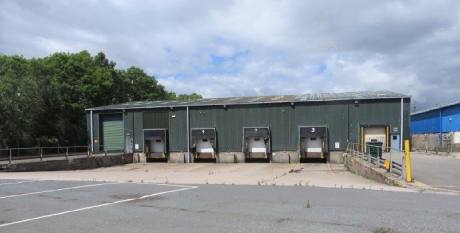 Unit 12 is detached warehouse which is currently fitted out as a cold store facility, although this could be removed.<br><br>Vehicular access via 2 no. level loading and 4 no. dock level loading doors.<br><br>A 0.54 acre secure lorry park is located...