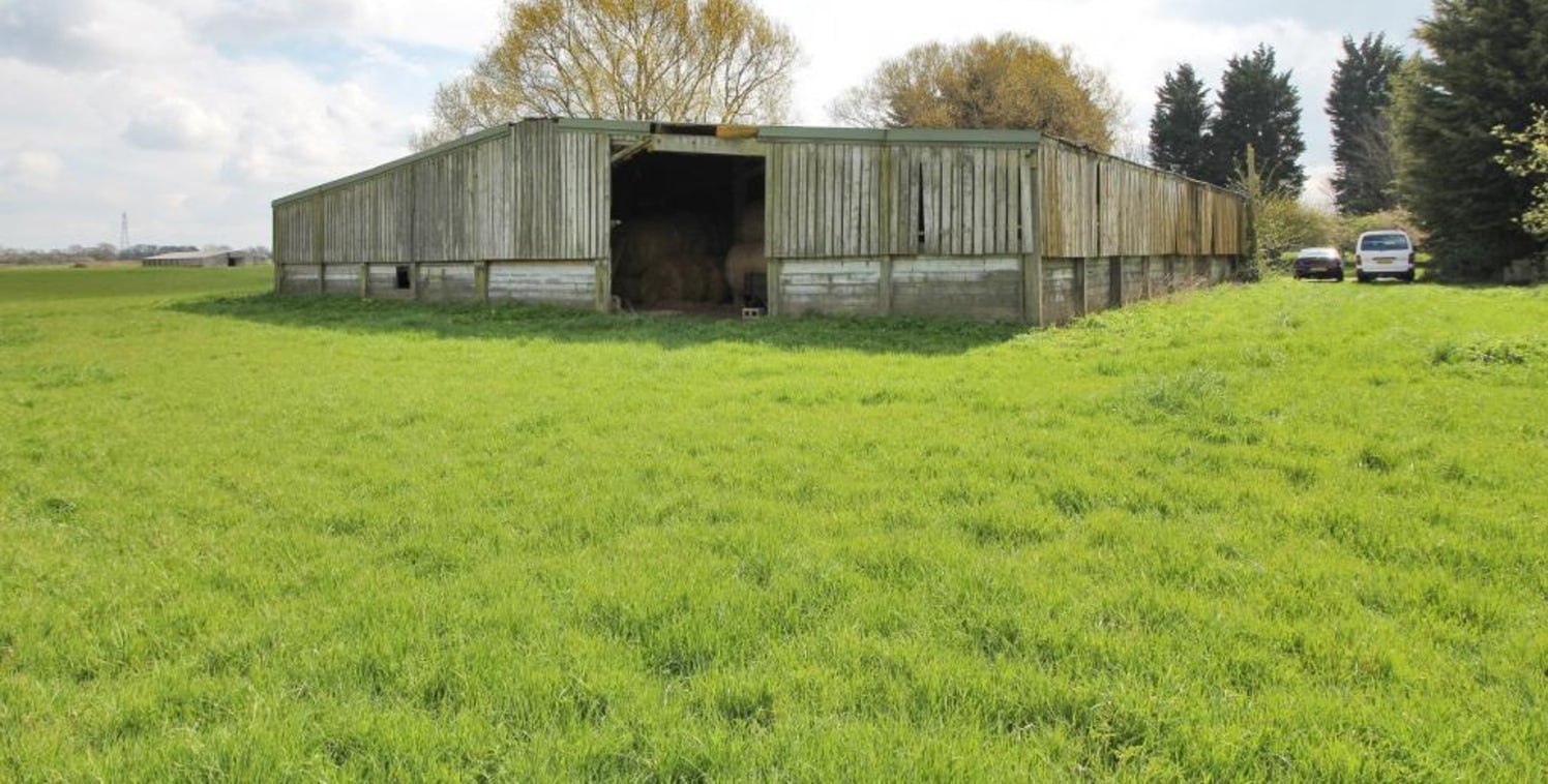 A rare opportunity to purchase a smallholding with detached farmhouse, range of general purpose farm buildings (two with residential consents) and good sized yards, all in a rural location with access to main line stations. In all approximately 22.02...