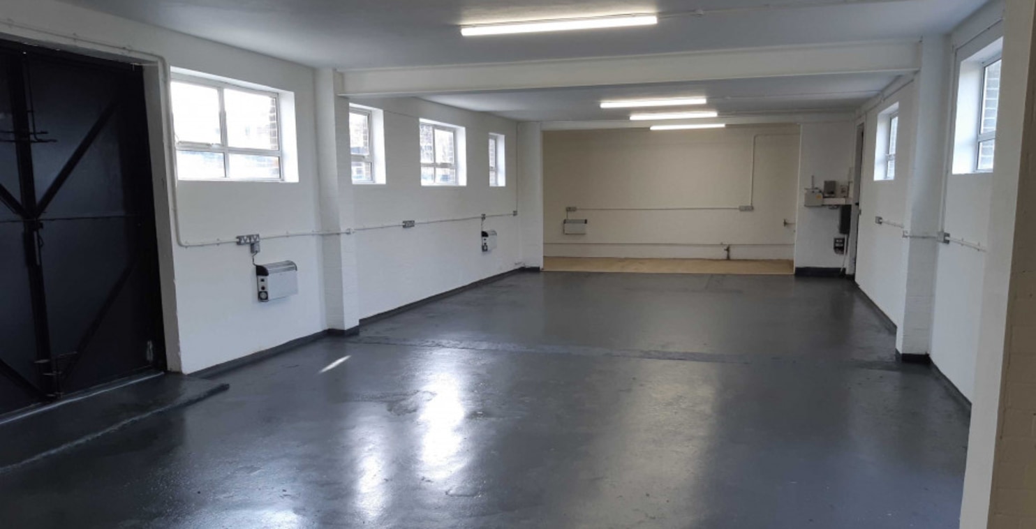 Refurbished Workshop. Single and 3 phase electricity supply, strip lighting, painted walls, extensive perimeter power points and electric heating. Four sets of doors - two double and two single. All are high security metal doors and provide secure ac...