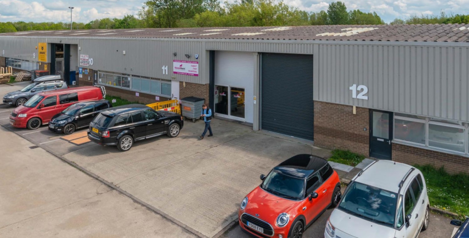 Refurbished industrial/warehouse unit of concrete frame construction under insulated pitched roof incorporating rooflights. 4.61m (15') minimum internal eaves height. Painted concrete floor, single phase electricity, new electrically operated roller...