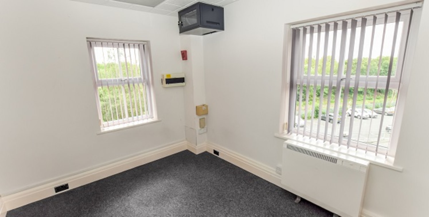 The premises comprise a modern purpose built three storey brick office building with ancillary car parking situated upon a secure courtyard style office complex.

The available accommodation is arranged over second floor level and is accessed via a s...