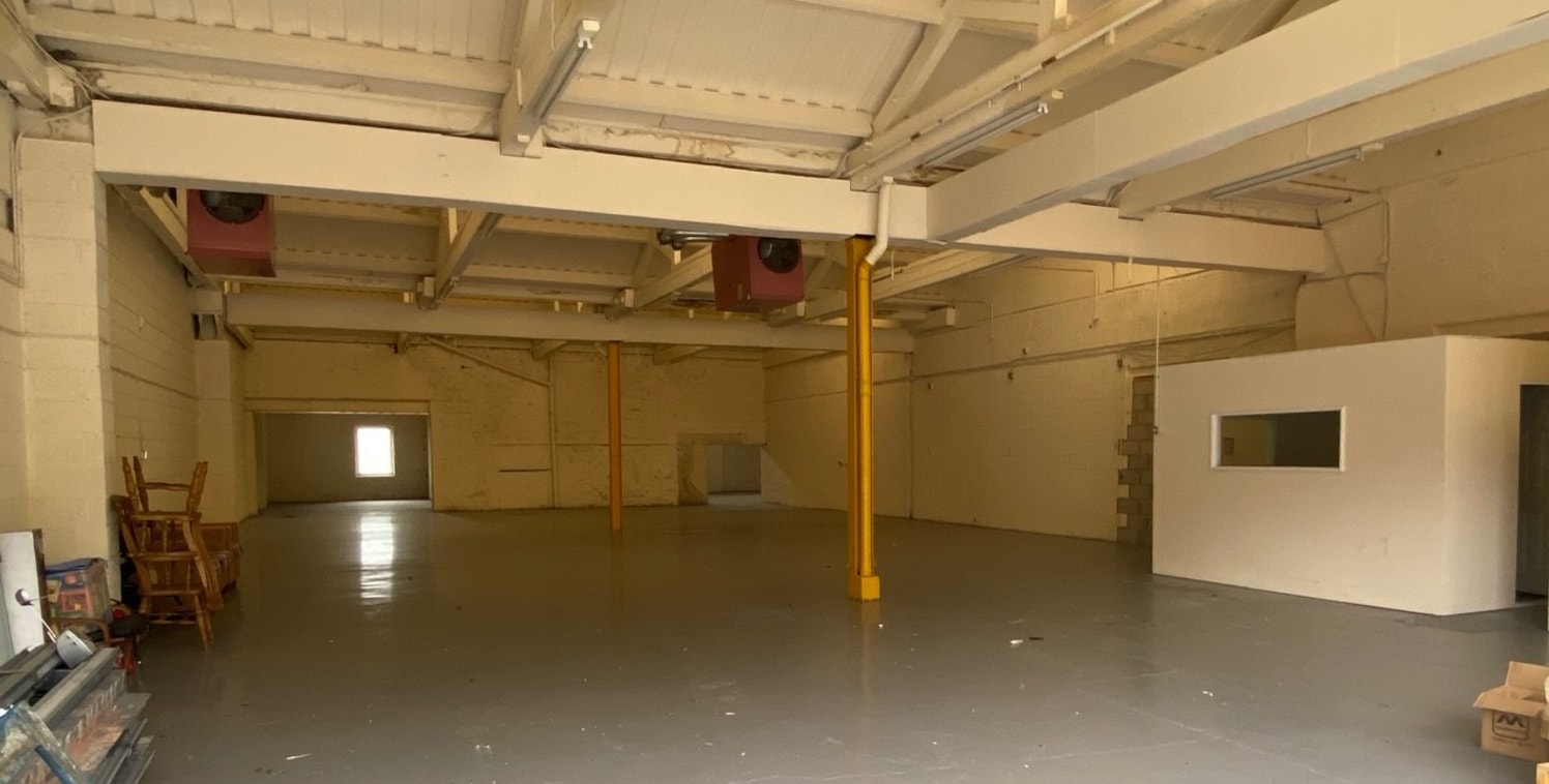 The subject property comprises a well-proportioned self-contained warehouse unit being arranged in 2 sections which are now available.

The front section has an eaves height of 3.58m with electrically operated roller shutter door with the main entran...