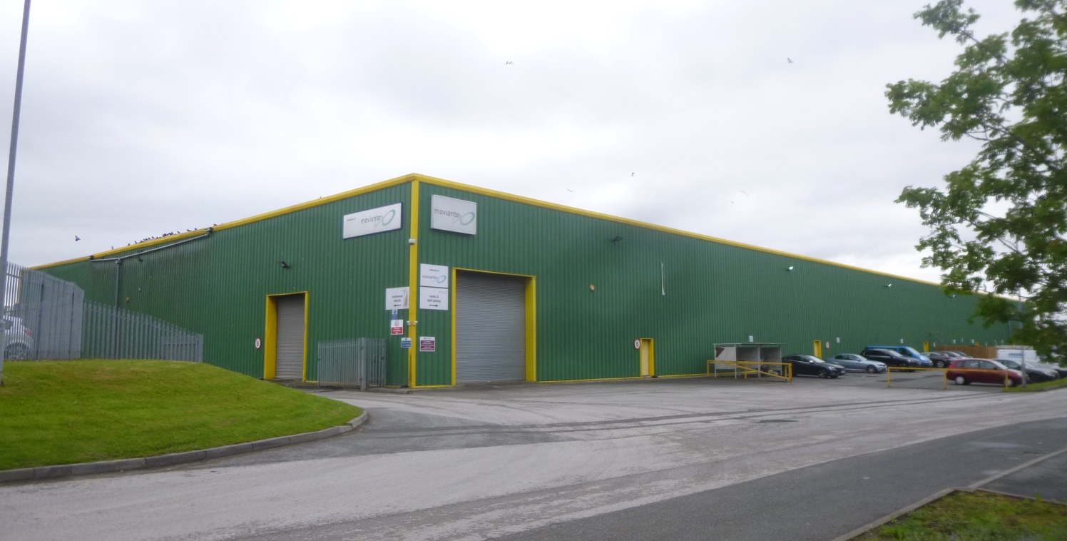 A single storey, detached warehouse facility of steel frame construction with integral offices.

* 7.7metre eaves height

* Fully fitted offices

* 5 dock loading doors, 1 ground level door

* Concrete surfaced yard

* Sodium lighting throughout

* E...