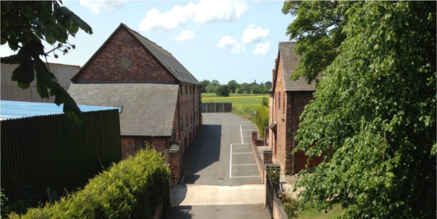 An attractive two-storey barn conversion which has been tastefully redeveloped providing modern office accommodation which is let out on a room-by-room basis. 

The redevelopment has taken into account the character of the building with many of the o...