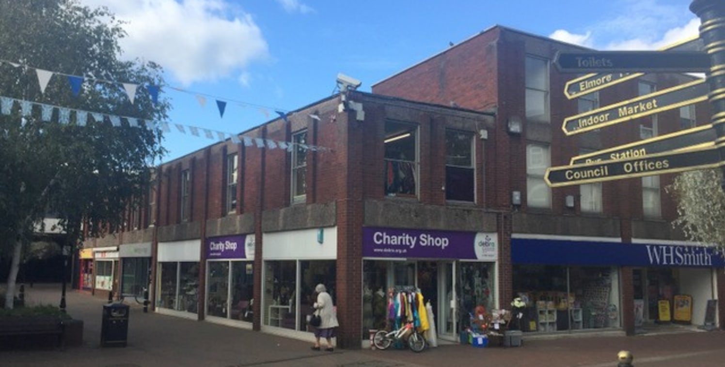 The property is prominently situated in Rugeley town centre on the west side of Brook Square, close to its junction with Upper Brook Street and a number of national multiple retailers including WH SMITH, SPECSAVERS, BOOTS, THOMAS COOK and CORAL.<br>T...