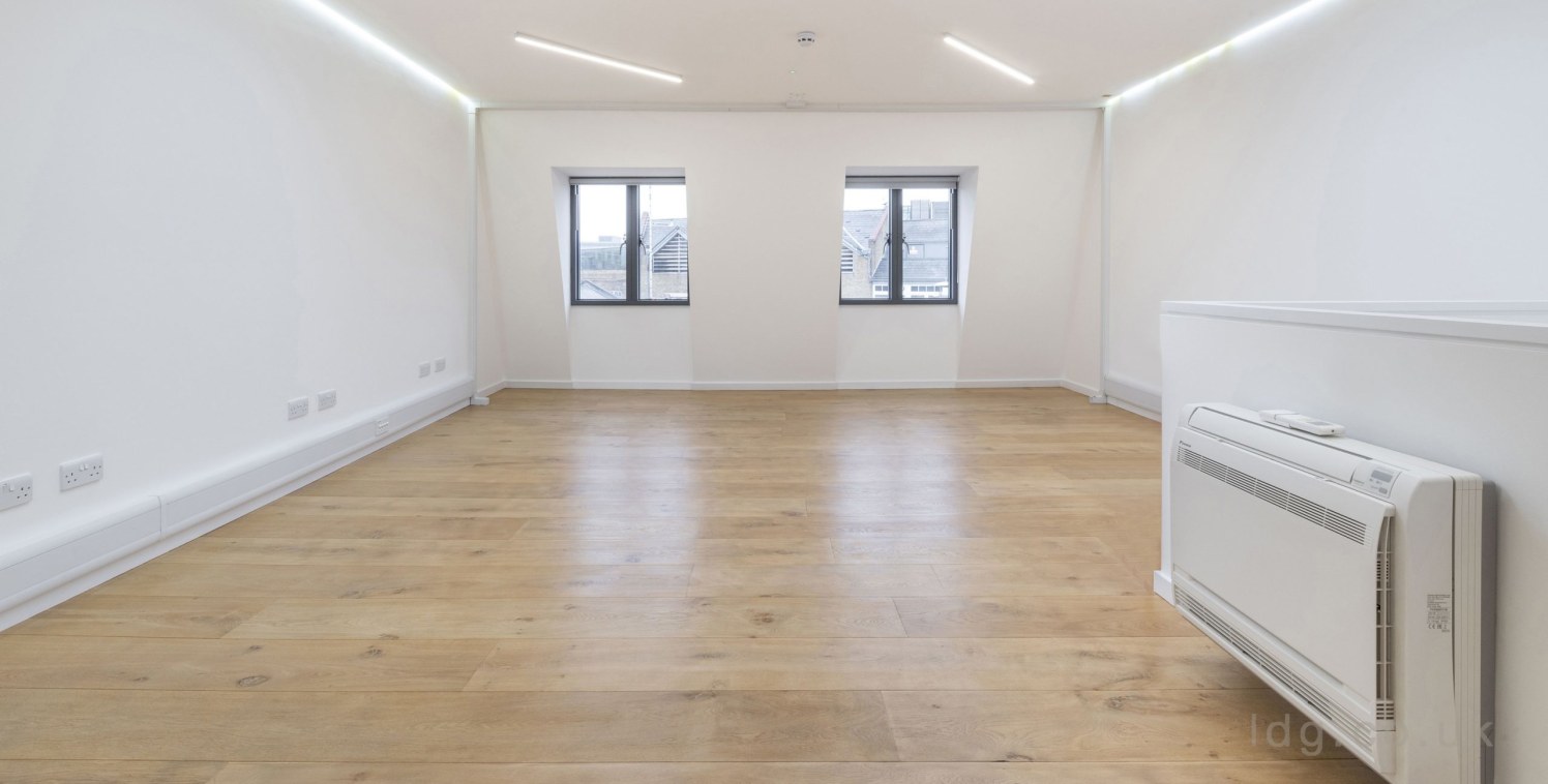 Strapline: Well designed duplex workspace in Seven Dials - Great natural light - Modern strip lighting - Wood...