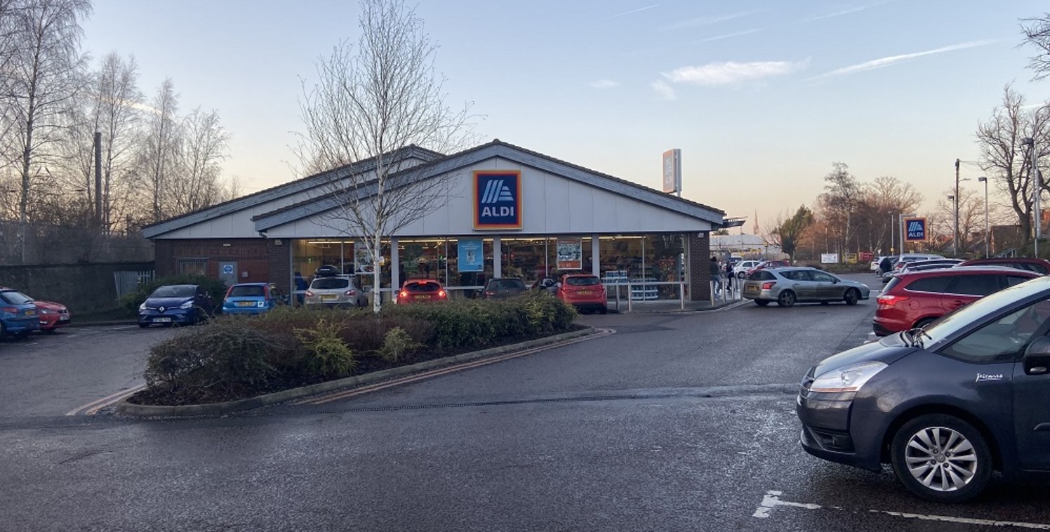 The property comprises a purpose built Food Store, together with an adjoining surface car park for 92 cars.