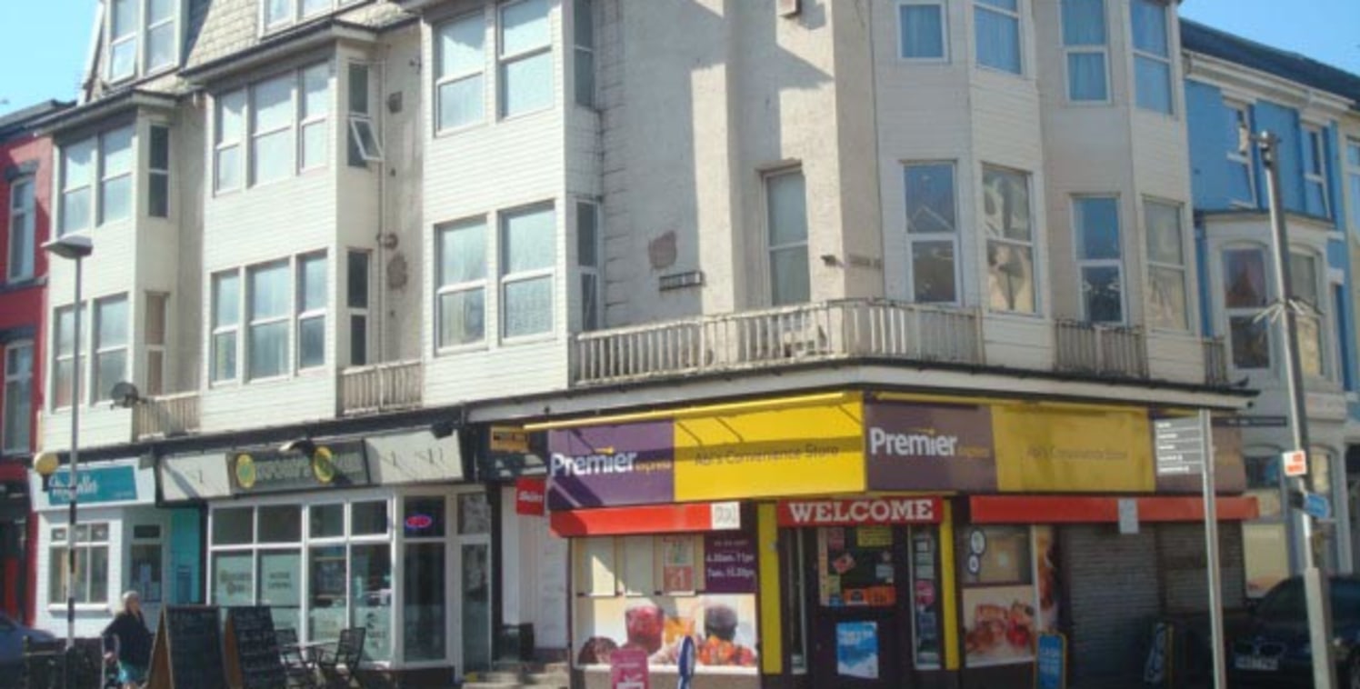 DESCRIPTION; A substantial 4 storey corner property located to the north of the Town Centre on the corner of Cocker Street and Dickson Road. 3 shop units to the ground floor plus 6 self contained flats to the upper floors. Potential rental income &po...