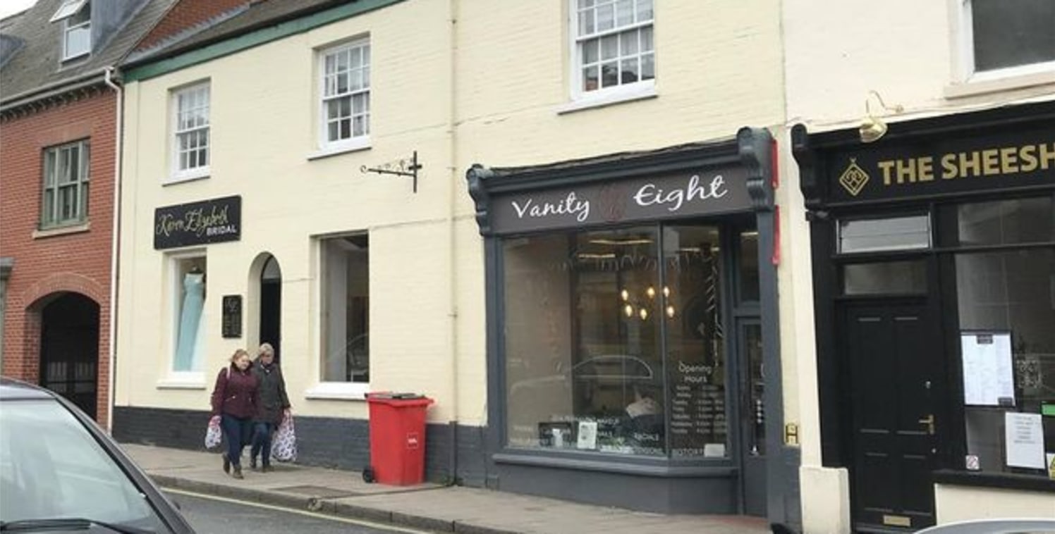 Prominent town centre retail premises. The property is arranged over ground floor providing open plan retail on split levels to the front elevation. To the rear are two further rooms which could be used for treatments or as ancillary office. The spac...