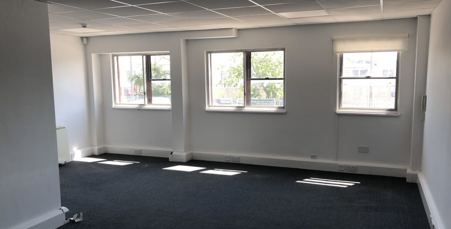 * One of 14 Trade / Industrial / Warehouse units. 

* Rear of unit fronting busy Gatwick Road.

* Ground floor warehouse, first floor offices and male and female WCs.