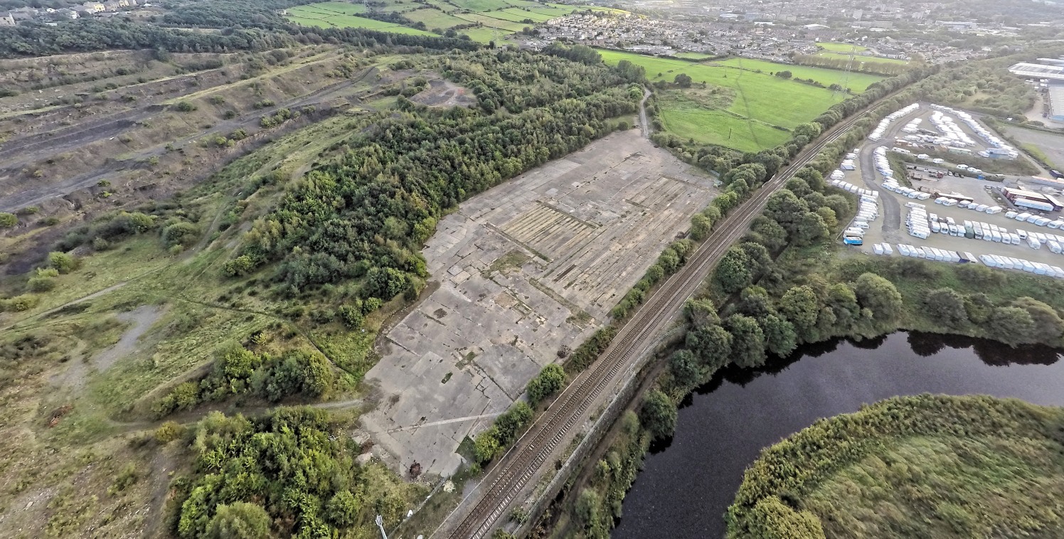 The property comprises a substantial rectangular shaped concrete surface site of level topography benefiting from;

Secure gates access

Close proximity to the M62 Motorway Network

Concrete hard surface

The Access to the site is provided via an exi...