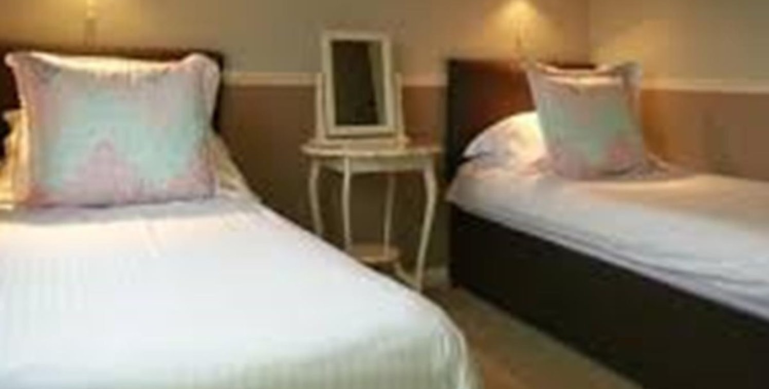 Freehold 13 Bedroom Guest House & Cafe In Looe For Sale\n2 Separate Owners Apartments\n4 Star Rated (Blue Flag)\nLicensed\nScope for Touring Pitches\nRef 2076\n\nLocation\nThis respected Guest House & Restaurant enjoys a desirable and prominent tradi...