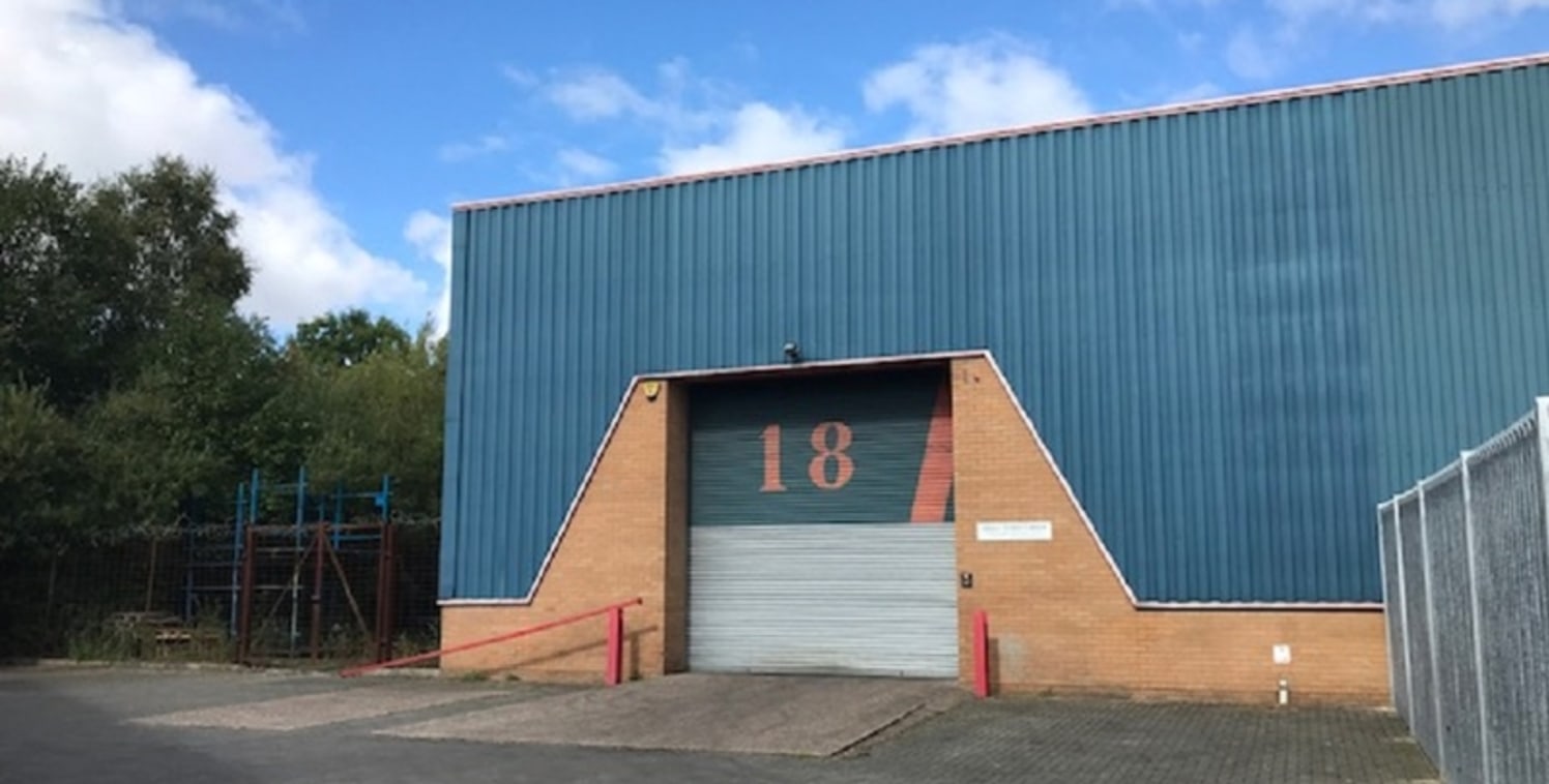 The property comprises a semi-detached industrial/warehouse premises of steel frame construction with brick/block and steel clad elevations beneath a steel clad roof incorporating translucent roof panels. The warehouse has a minimum eaves height of a...