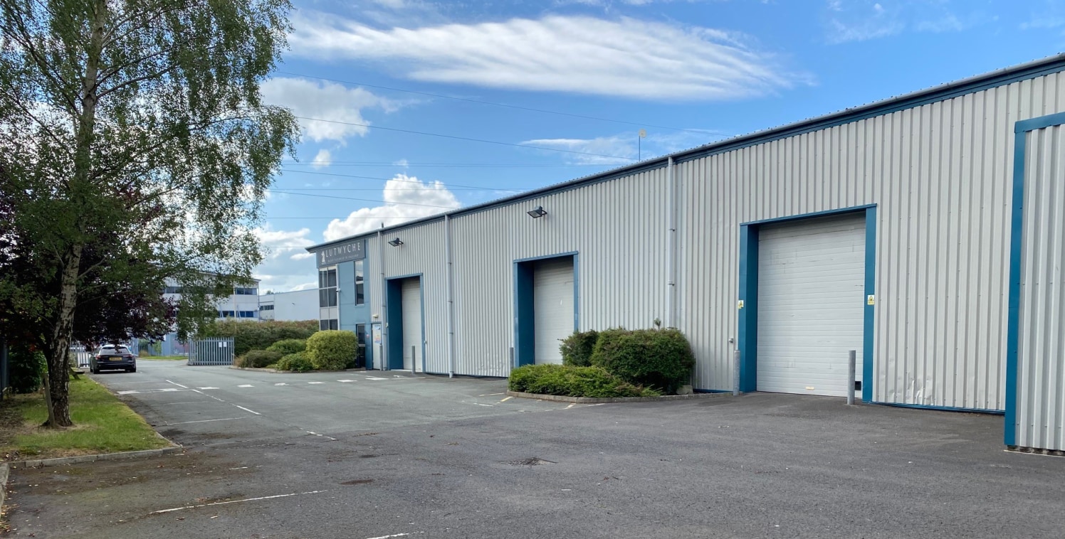 The unit is detached and rectangular in shape, providing car parking to the front and servicing/HGV access to one side. The unit is fully ring fenced with palisade security fencing.