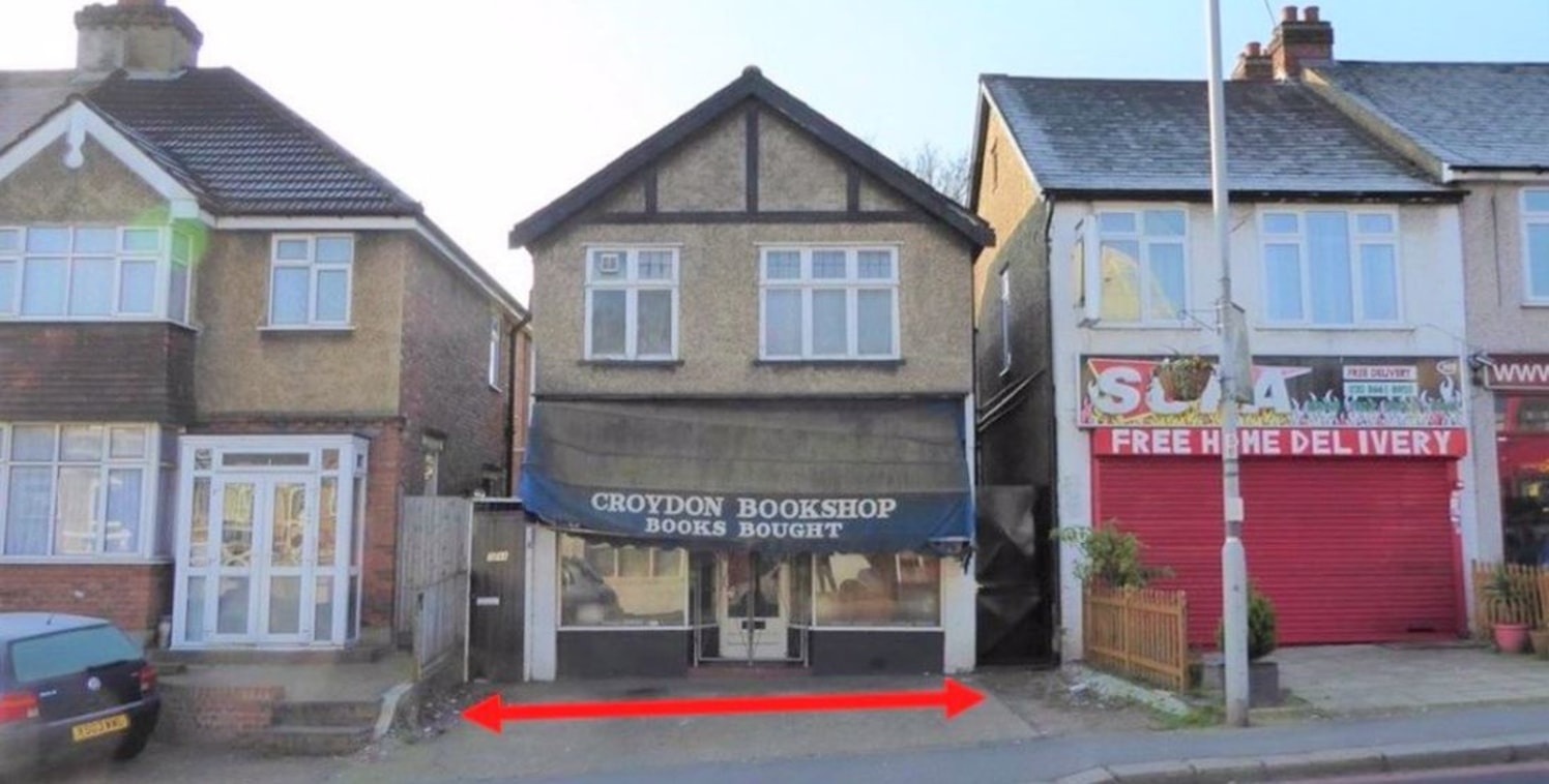 Ground floor retail unit with 1 bedroom flat above and front forecourt with parking for 2 cars. Planning has been submitted to reduce the shop and create additional residential space to the rear