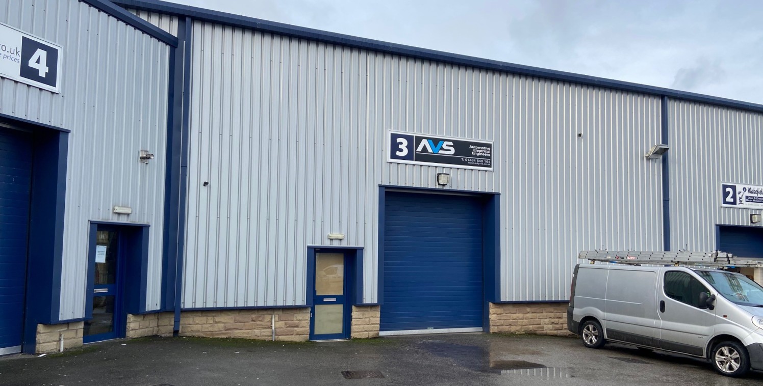 Unit 3 comprises a mid-terrace, modern industrial unit constructed with a steel portal frame, a pitched profile sheet roof incorporating translucent rooflight panels, block walls to approx. 2m with cladding above on the external elevations and jumbo...