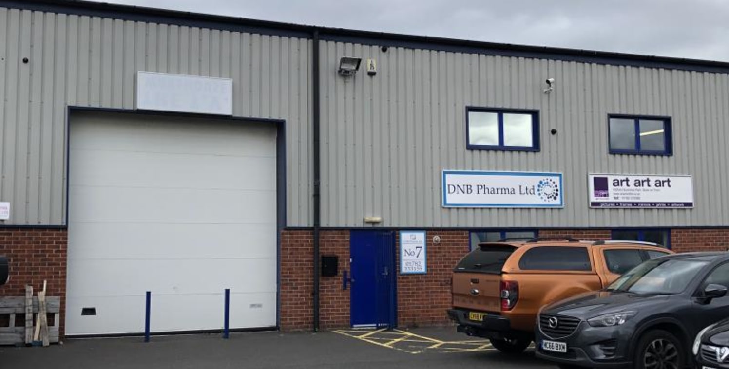 The property comprises a modern, mid-terrace industrial unit of steel portal frame construction beneath an insulated, steel profile clad roof surface. It briefly benefits from the following characteristics:\n* Roller shutter door access\n* 6-meter ea...