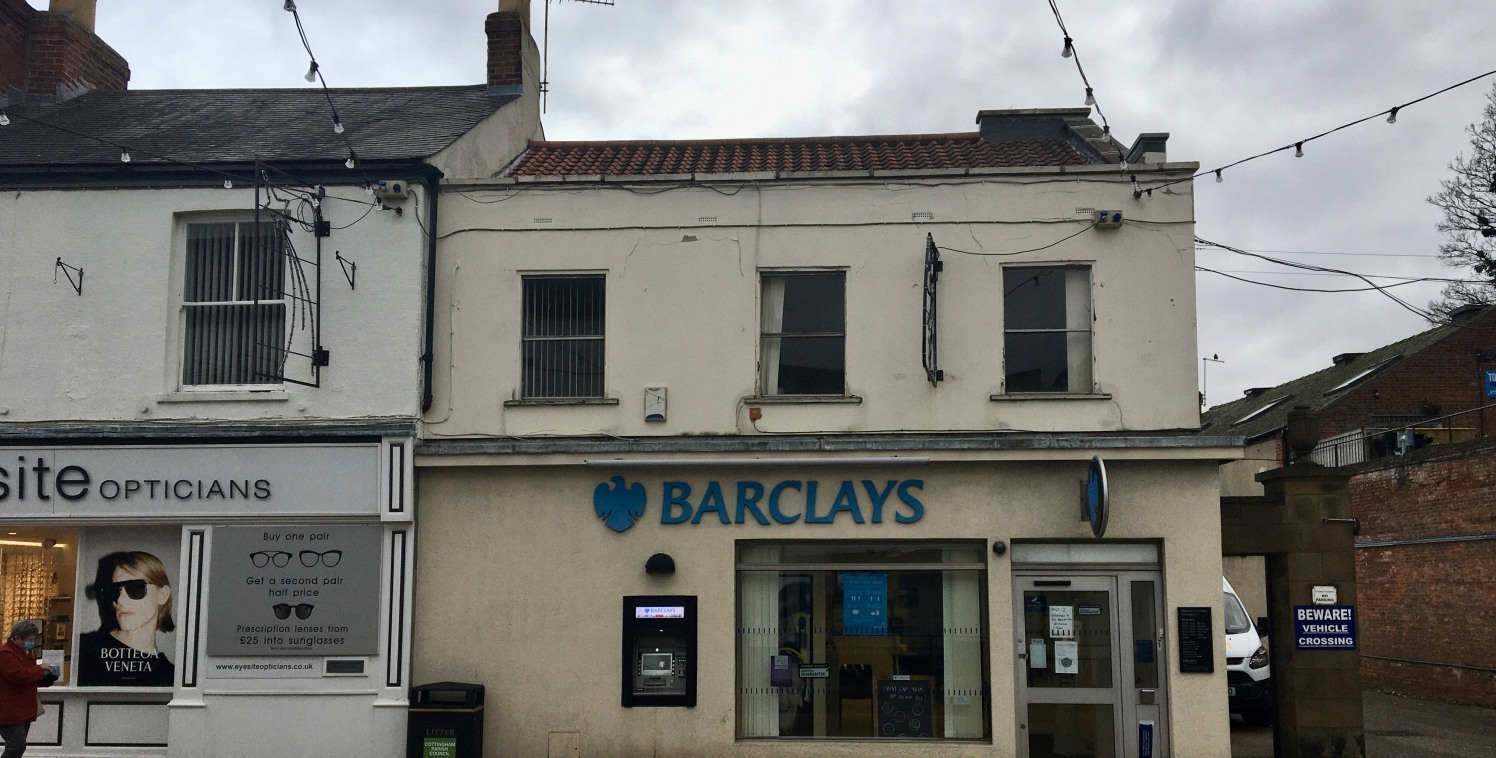 The property comprises a two storey former banking premises assumed to be of traditional masonry construction with a painted concrete render, under a pitched roof with concerete interlocking tile covering. There is a single storey brick built extensi...