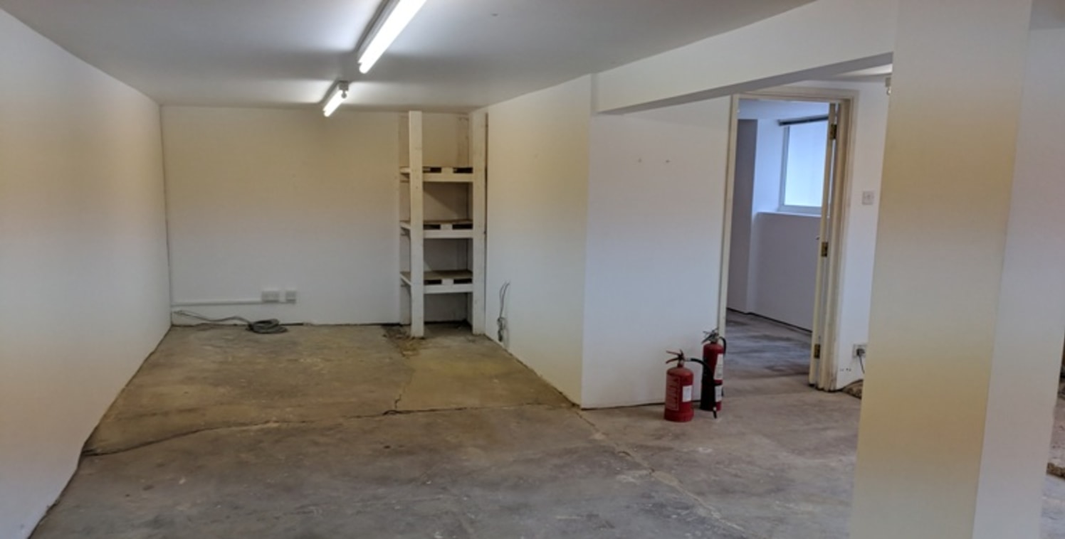 The premises comprise a self-contained two storey brick constructed building under a tiled pitched roof and a single storey extension to the front with a felt covered flat roof. The accommodation offers a ground floor industrial warehouse, kitchen an...