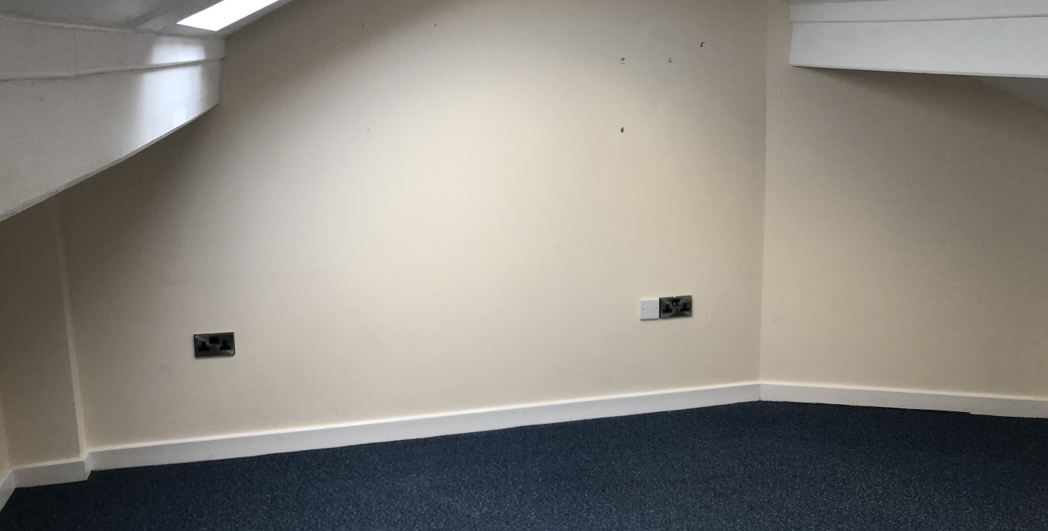 The subject property comprises an end of terraced retail premises, which was formerly the Doffcocker Post Office.

The available accommodation is situated at second floor level and provides a modern, single office room with shared kitchen and WC faci...