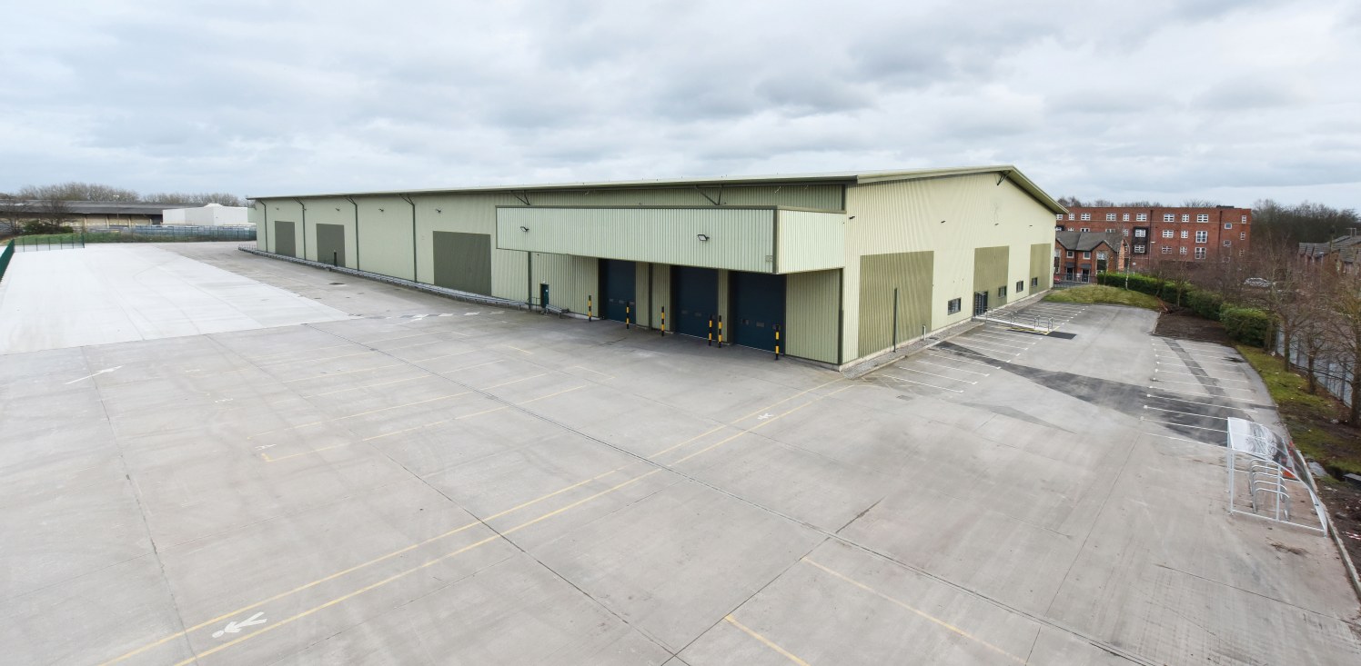 Profile metal clad elevations. Steel portal frame construction. 10.24m eaves height. 6 Level acces loading doors. Ground floor offices. Up to 499 kVa powercapacity. Secure self-contained site.