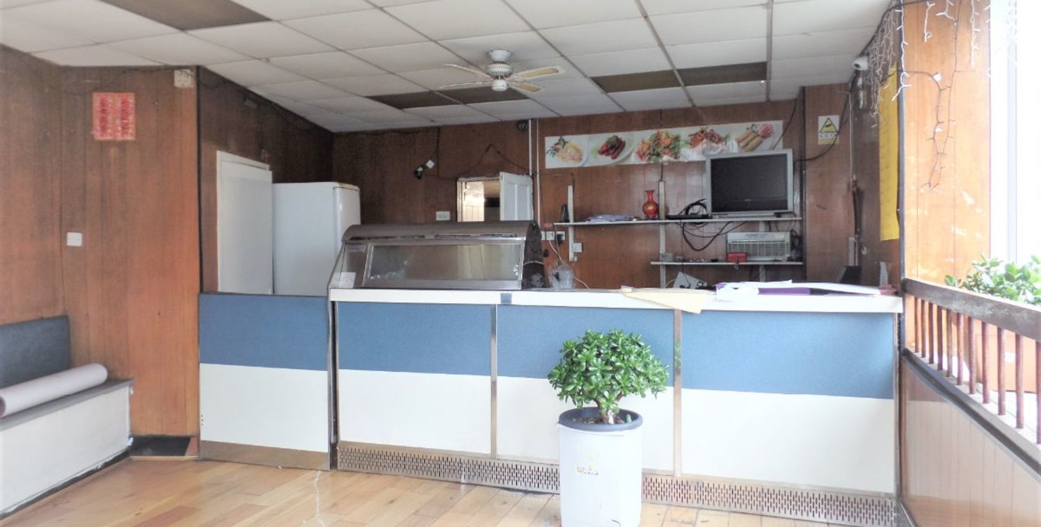 Offers Now Invited for this Freehold Double Semi-Commercial Property available with vacant possession, ideal for either owner/occupier looking to reside above their own takeaway business or as a development property with heaps of potential, subject t...