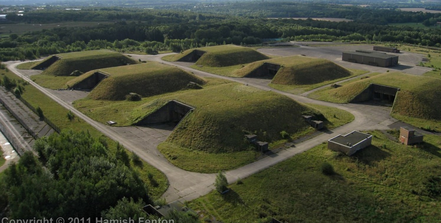 The buildings comprise the former nuclear missile bunkers for the former Greenham Common Airbase. 

The bunkers are constructed of concrete with steel doors and are considered to be highly secure. They measure 40.9m long x 4.86m width x 3.92m height...