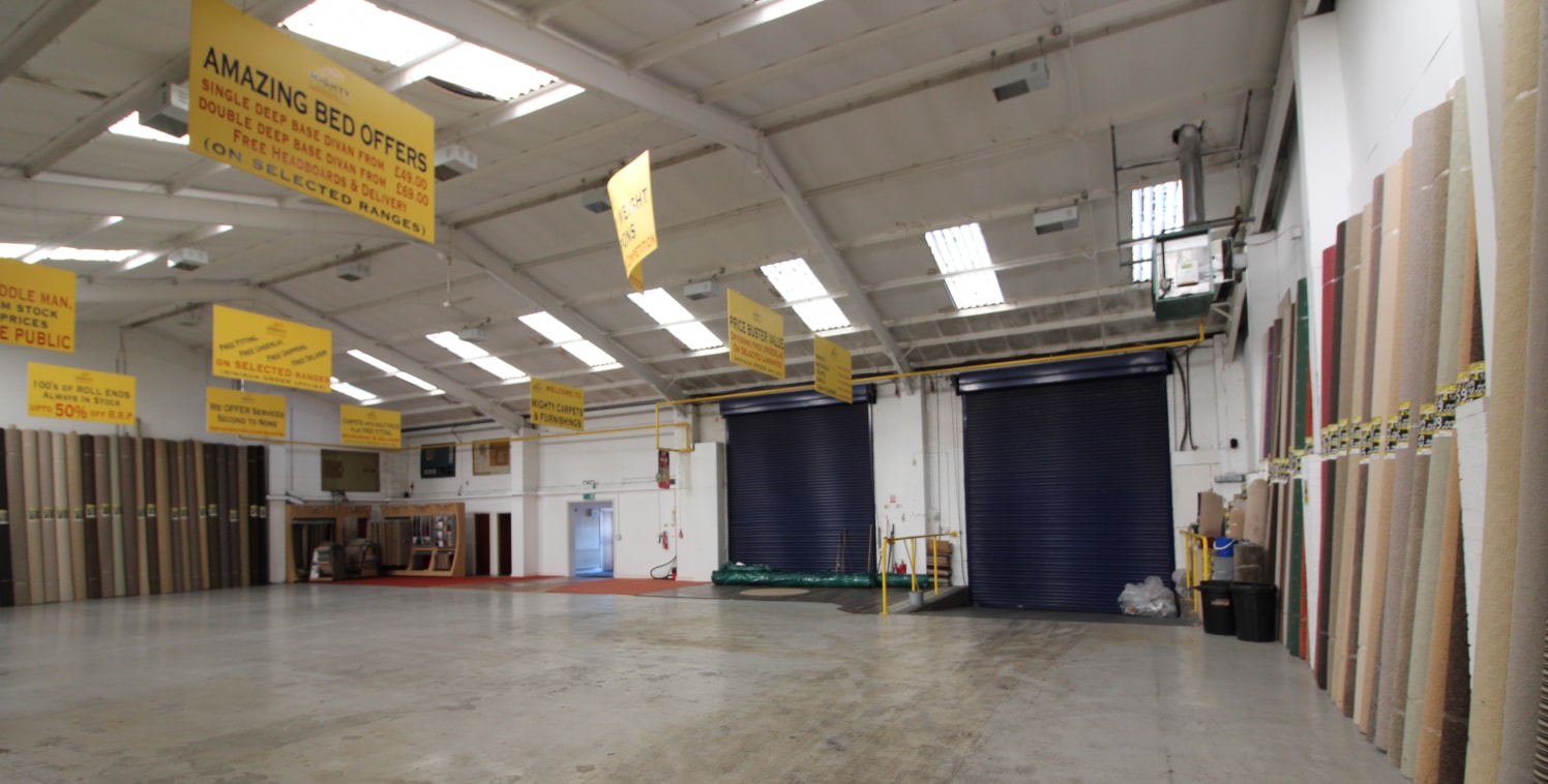 LARGE industrial warehouse/trade counter premises with secure yard in SELLY...