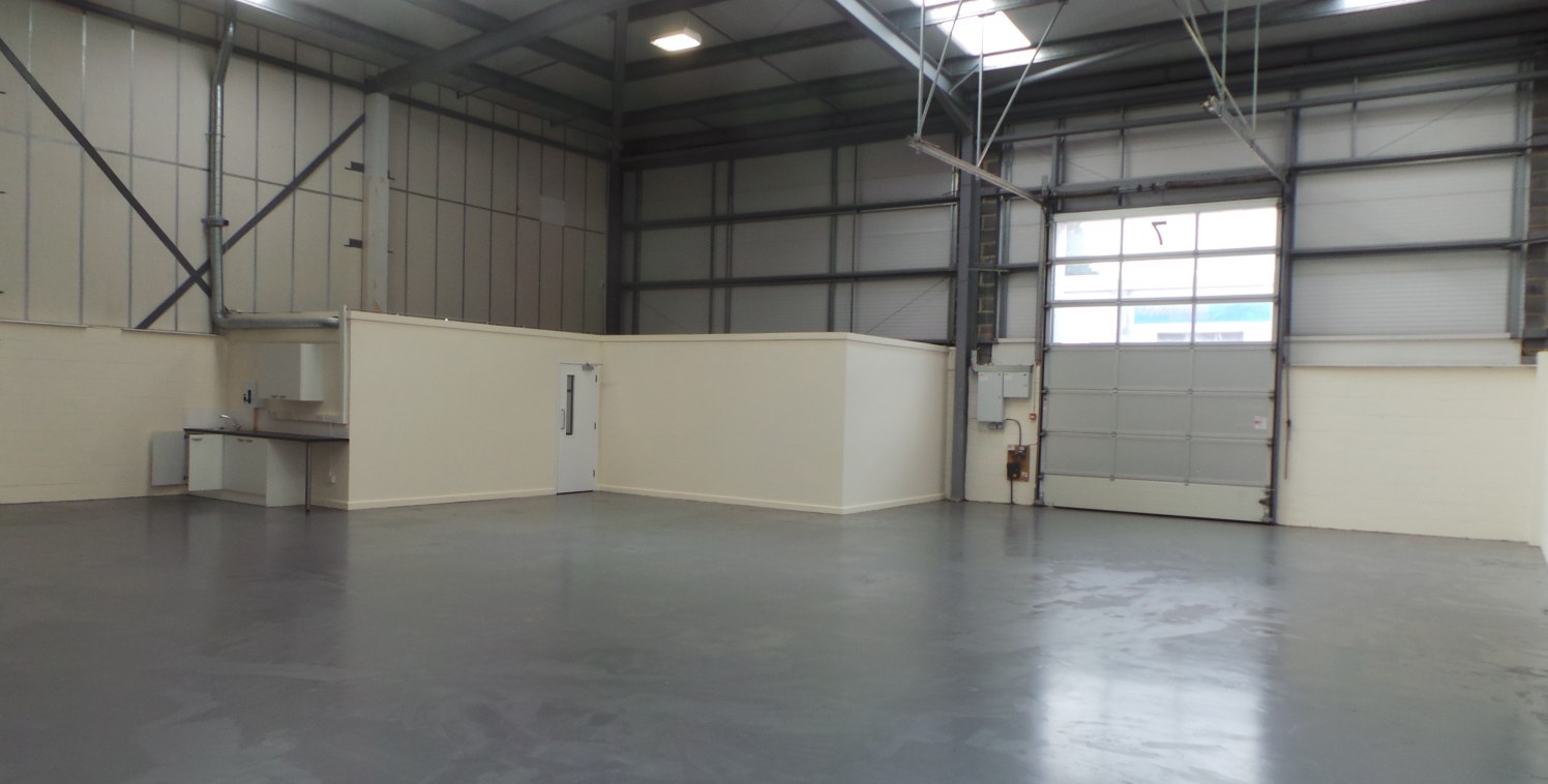 This end-terraced industrial unit of steel portal framed construction provides a little under 3,000 sq ft of accommodation. There is a minimum eaves height of 20ft 4'', rising to a maximum of 24ft 1'' at the apex. The premises were constructed in the...