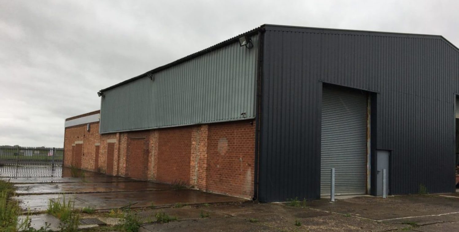 The property comprises a warehouse which is of portal framed construction with part solid elevations and part insulated cladding to the elevations and pitched roof. The warehouse is open plan in layout and benefits from an office to the rear which ha...