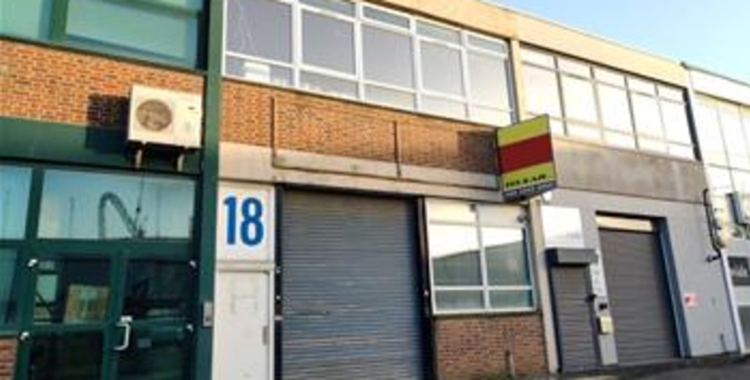 The premises comprise a mid-terraced two story business unit of brick elevations to a flat roof. The ground floor warehouse area is of an open-plan layout and ancillary office/ storage accommodation is located to the first floor level....