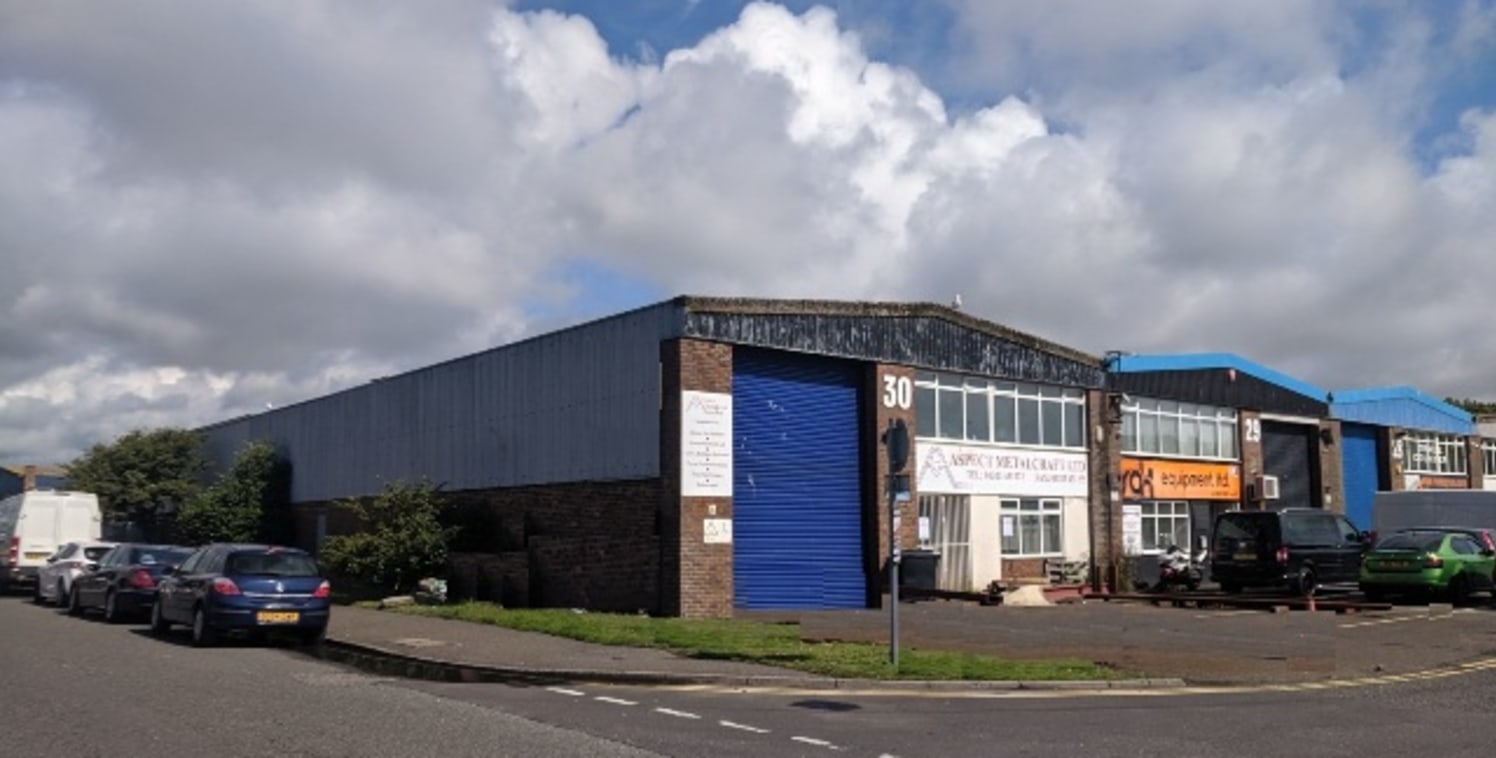 The unit is a prominent corner positioned industrial premises of steel portal frame construction with brick block and part steel cladding offering factory with WC, reception and offices over ground and first floor measuring approximately 3,371 sq ft....