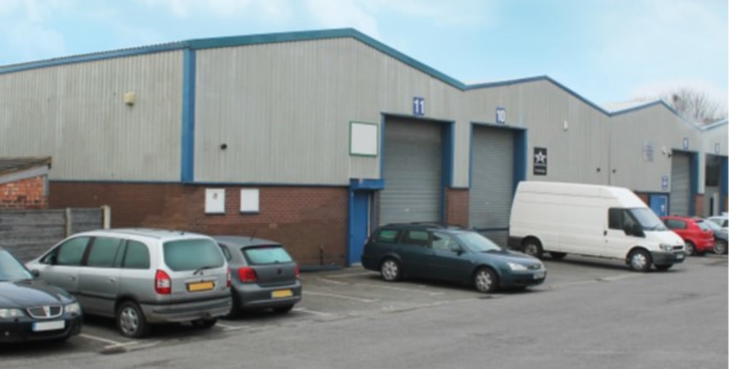 Steel portal frame construction. Approximate eaves height 5.2m (16.11 ft). Breeze block walls and concrete floors. Roller shutter door access. Toilet facilities. Lighting in warehouse / industrial area. Car parking. Established industrial location. C...