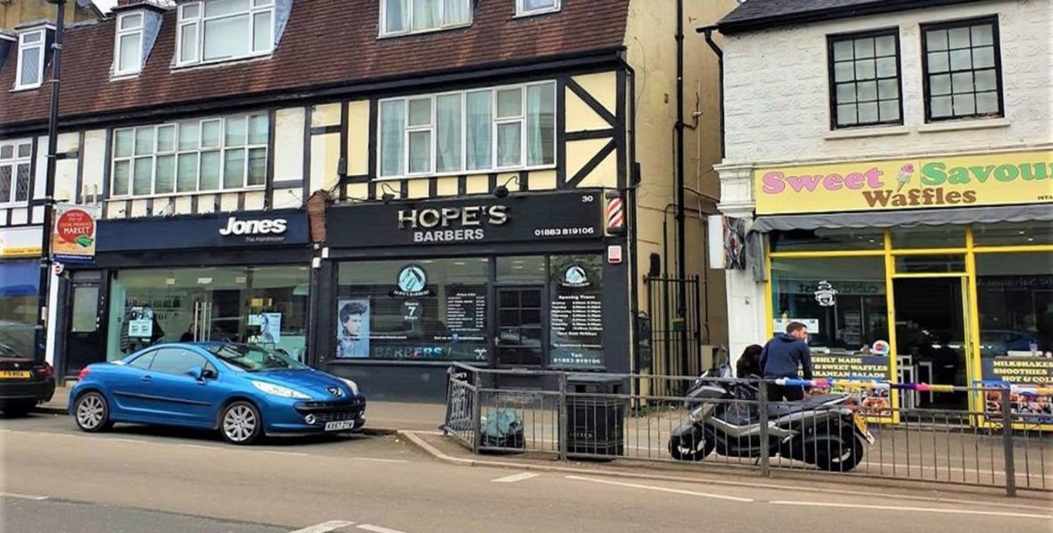 End of terrace ground floor commercial unit trading as a barbers with 2 x one bedroom flats above over two floors and a spacious area to the rear of the property which could be used to extend the existing and or build independently