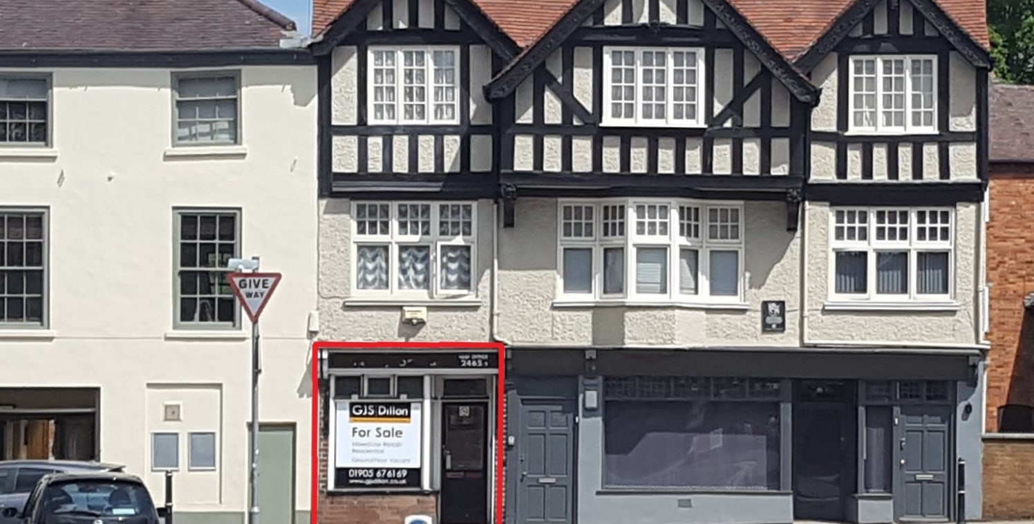 A ground floor retail unit located in a prominent position fronting the main A40 which is a main arterial route into Worcester city centre.

Vacant ground floor retail unit with an occupied two bedroom flat above.