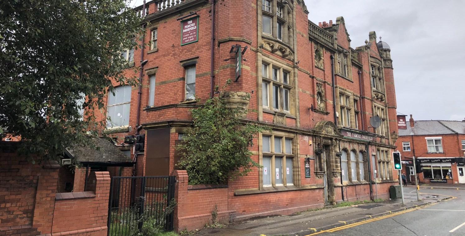 The property comprises a three storey Grade II listed period property formerly used as a public house/hotel together with a plot of land to the rear formerly used as a bowling green together with car parking. 

The site has a total area of approx. 1...