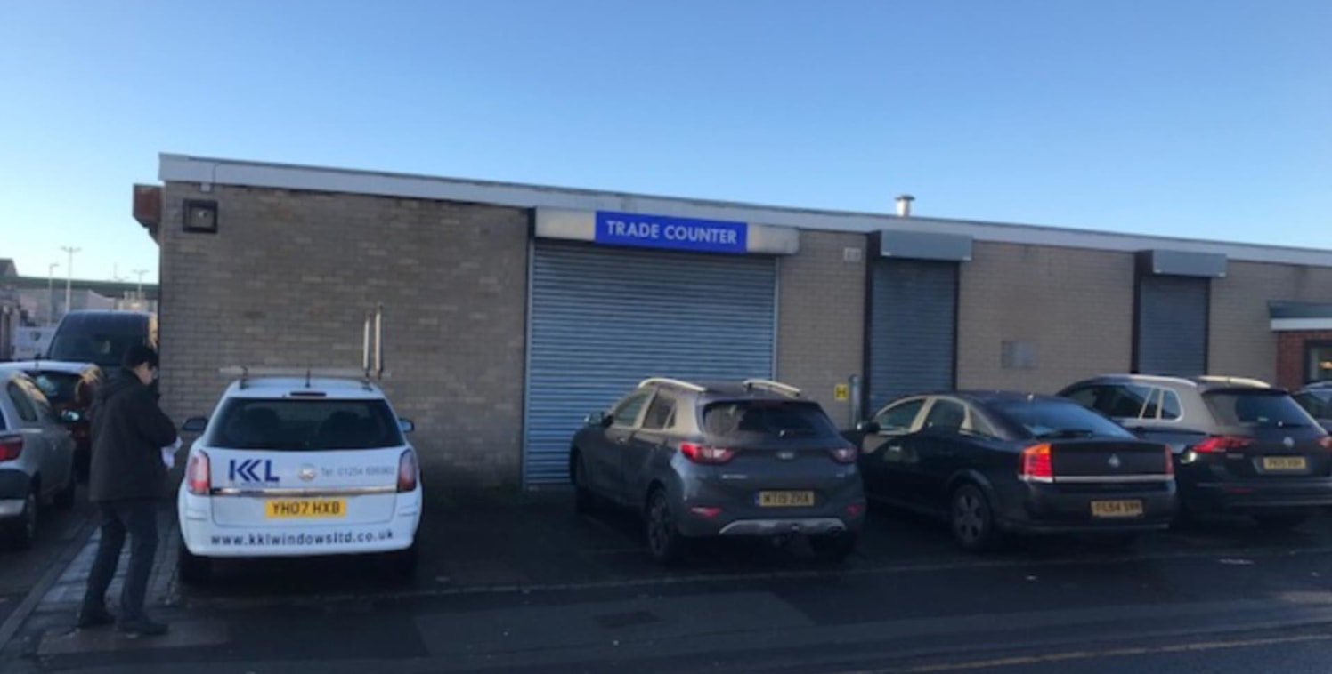 The property comprises a single storey end terraced industrial unit benefitting from a roller shutter door and car parking to the front.<br><br>Accommodation<br><br>We have calculated the gross internal area of the premises to be 3,390 sq.ft....