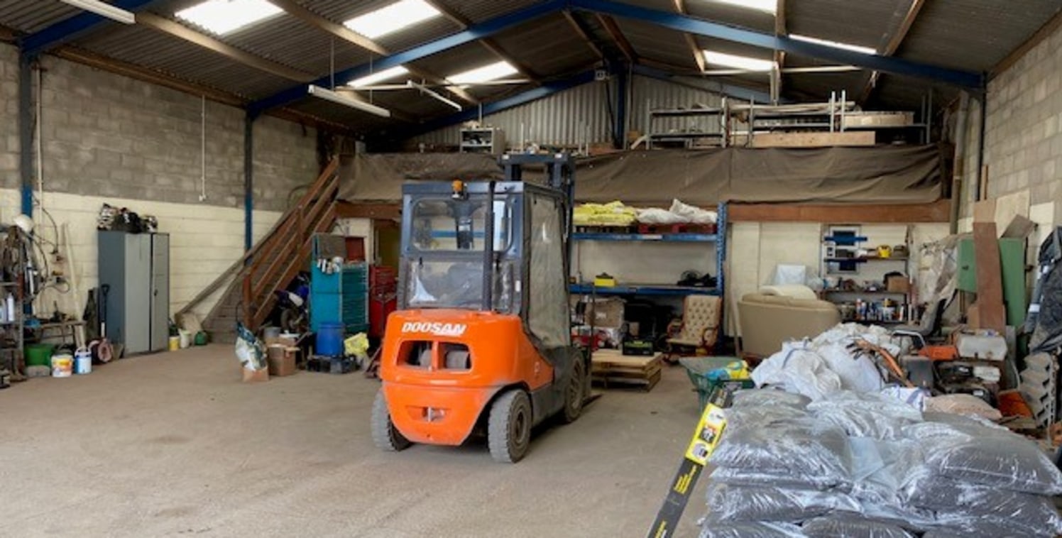 A detached single storey warehouse and trade unit with an internal eaves height of 4.25m. There is on-site parking and yard space available.

The unit is constructed of a steel portal frame with concrete block walls and a part profiled sheet roof and...