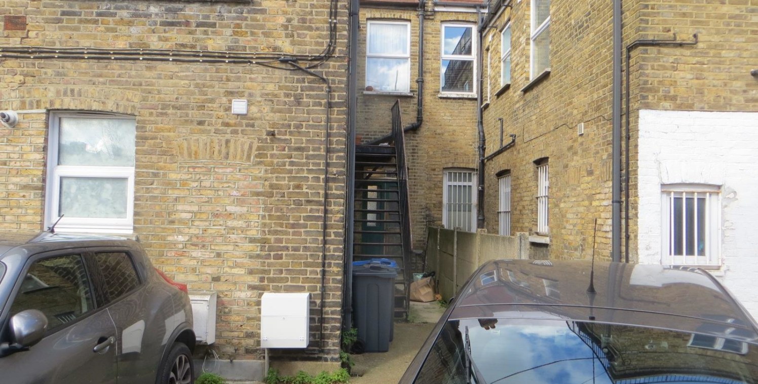 * Entire property currently consisting of ground floor retail with a self contained maisonette above.

* Two ground floor shops 

* 2 bedroom flat above

* Rear parking space

* Potential to add value by improving the residential income, undertake de...