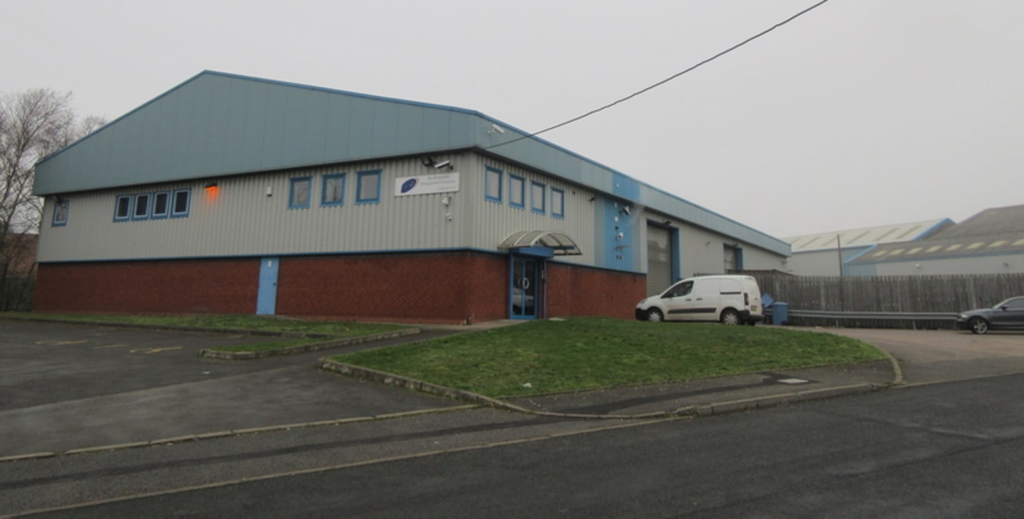 The premises is a modern industrial building of steel portal frame construction with concrete floor, elevations of blockwork and cladding above. The pitched roof incorporates roof lights and access is via two steel roller shutter doors in the side el...