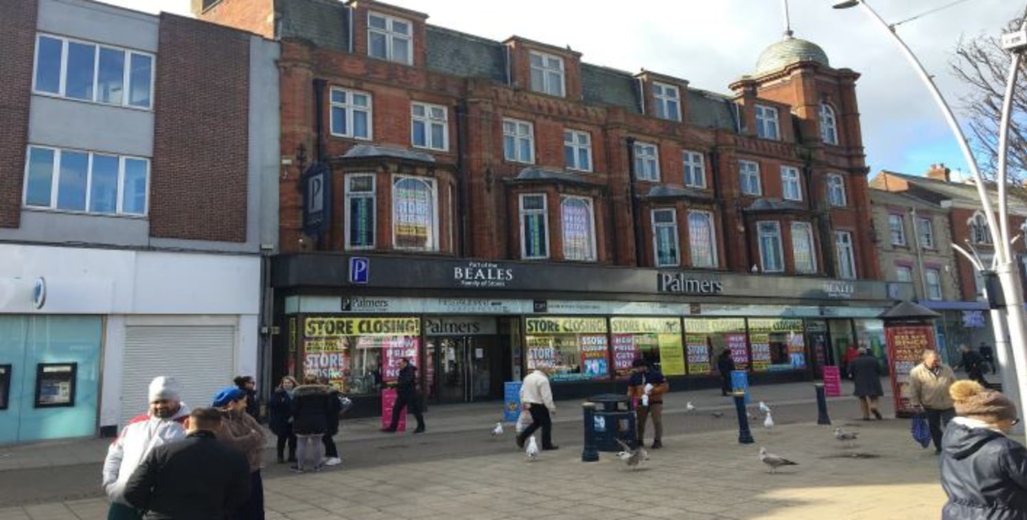 The property comprises a substantial former department store with extensive frontages to Market Square and at the rear facing a public car park on Howard Street South. 

The property is of brick construction on ground and three upper floors benefitti...