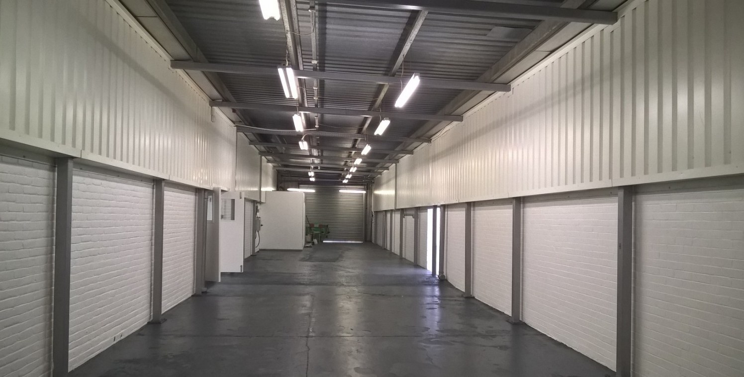 The unit has its own loading door and comprises a rectangular shaped unit with a small yard to the rear, which is accessed through the unit.