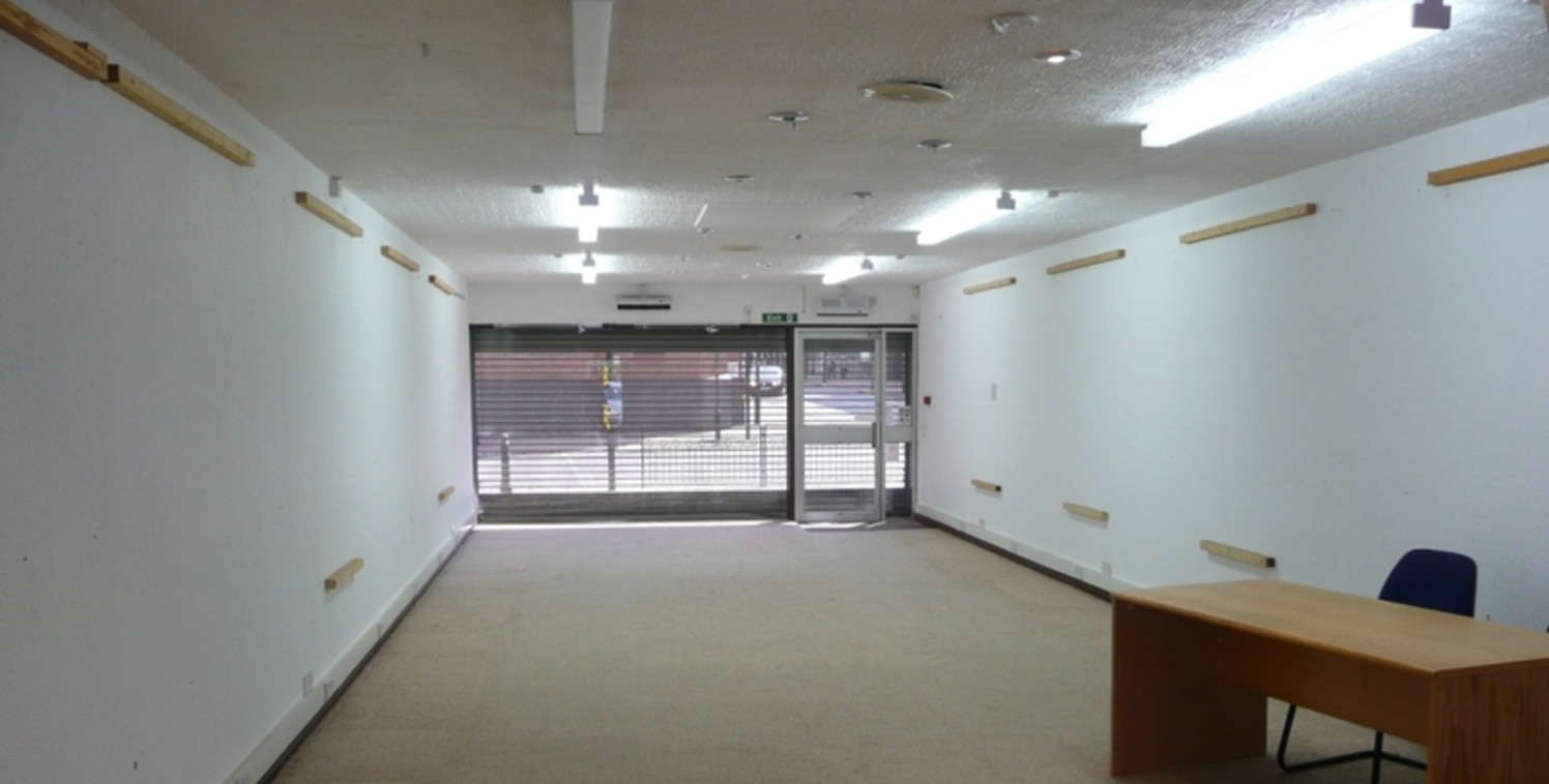 The premIses comprIse ground floor retaIl sales/ showroom wIth full heIght fully glazed dIsplay wIndow and glazed sIde entrance frontIng School Street benefItIng from electrIcally operated metal roller securIty grIll. StaIrs at the rear lead to fIrst...