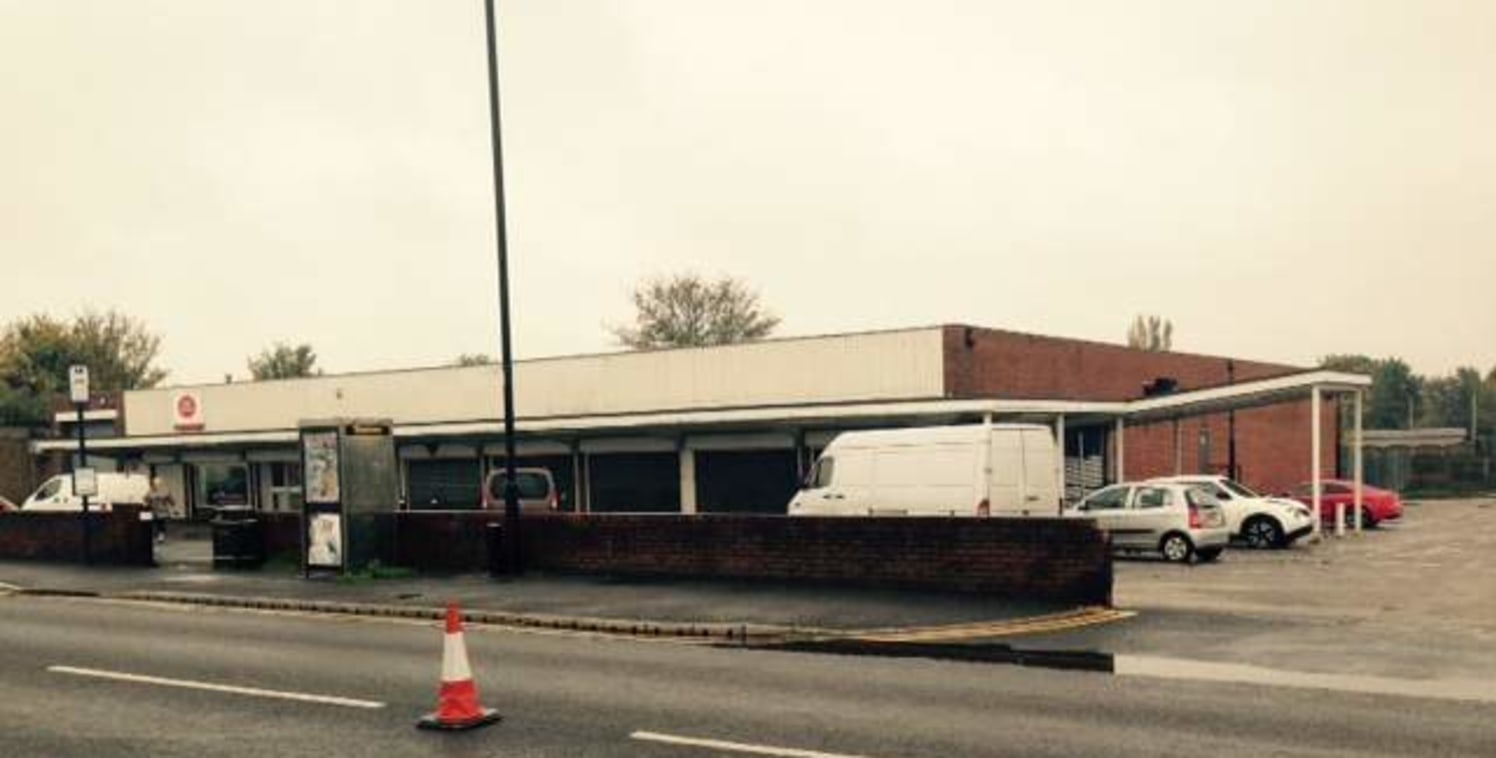 The property comprises a single storey former supermarket. To the front and side of the property is a private car park and a dedicated loading bay is accessible to the front and rear elevation.