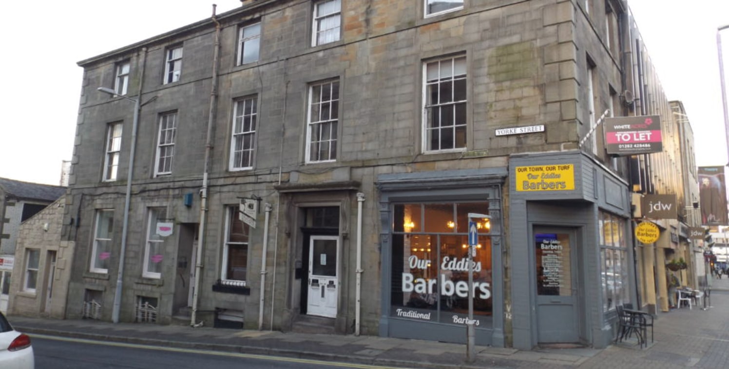 LOCATION\n\nSituated next to Burnley Mechanics and the Town Hall near to the junction of Yorke Street and Manchester Road, one of the busiest routes into the town centre. The premises are in a mixed commercial area comprising retailers and profession...