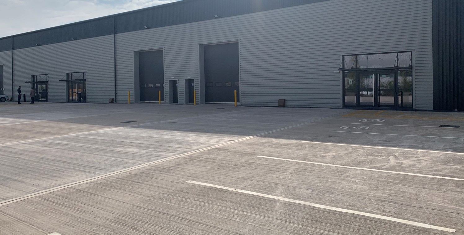 7.5m eaves. Automatic powered loading doors. Serviced yard to accommodate HGV's. Adjacent to A41 and M53. Electronic level access loading doors. WC & kitchenette provision. Glazed feature entrance. Service yard. 3 phase power and gas supply. Availabl...