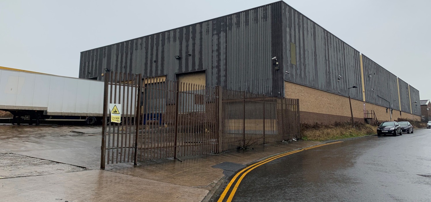 The property comprises a three bay steel portal framed warehouse building having an eaves height of approximately 6.3m and access by way of four roller shutter loading doors (3 tailgate and 1 drive-in). Externally the property is served by an enclose...