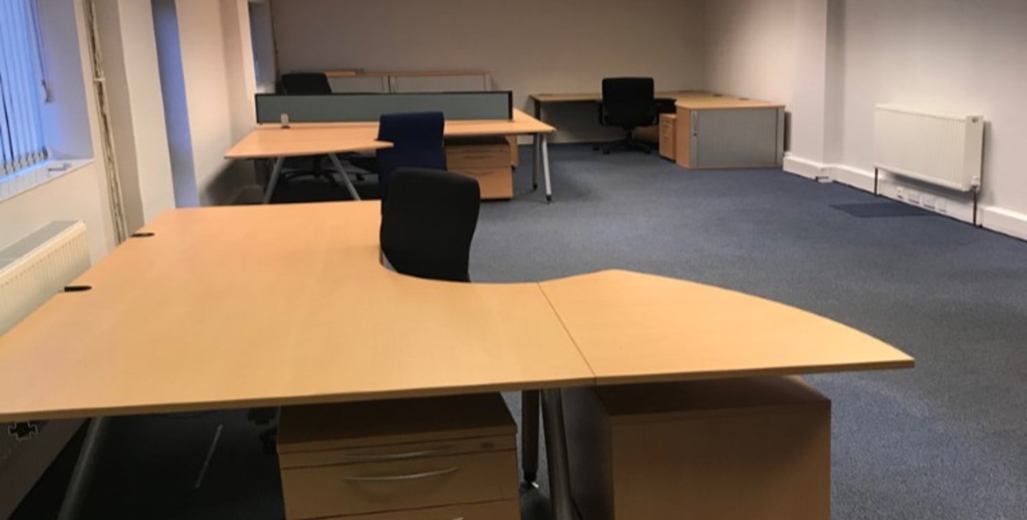 The property comprises a modern ground floor office suite with window frontage that comes fully furnished. 

It is situated within Roy Trevor Removals Depot where allocated parking is provided for up to 6 vehicles. 

WC, kitchen and boardroom facilit...