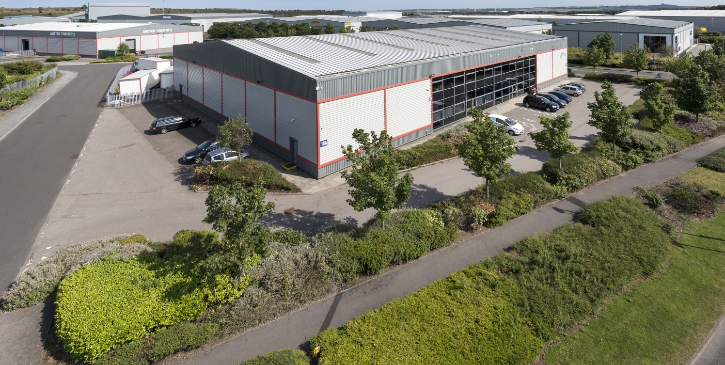 6.5m eaves. Ground floor offices. 5m high loading doors. Large secure concrete service yard. Well landscaped estate.