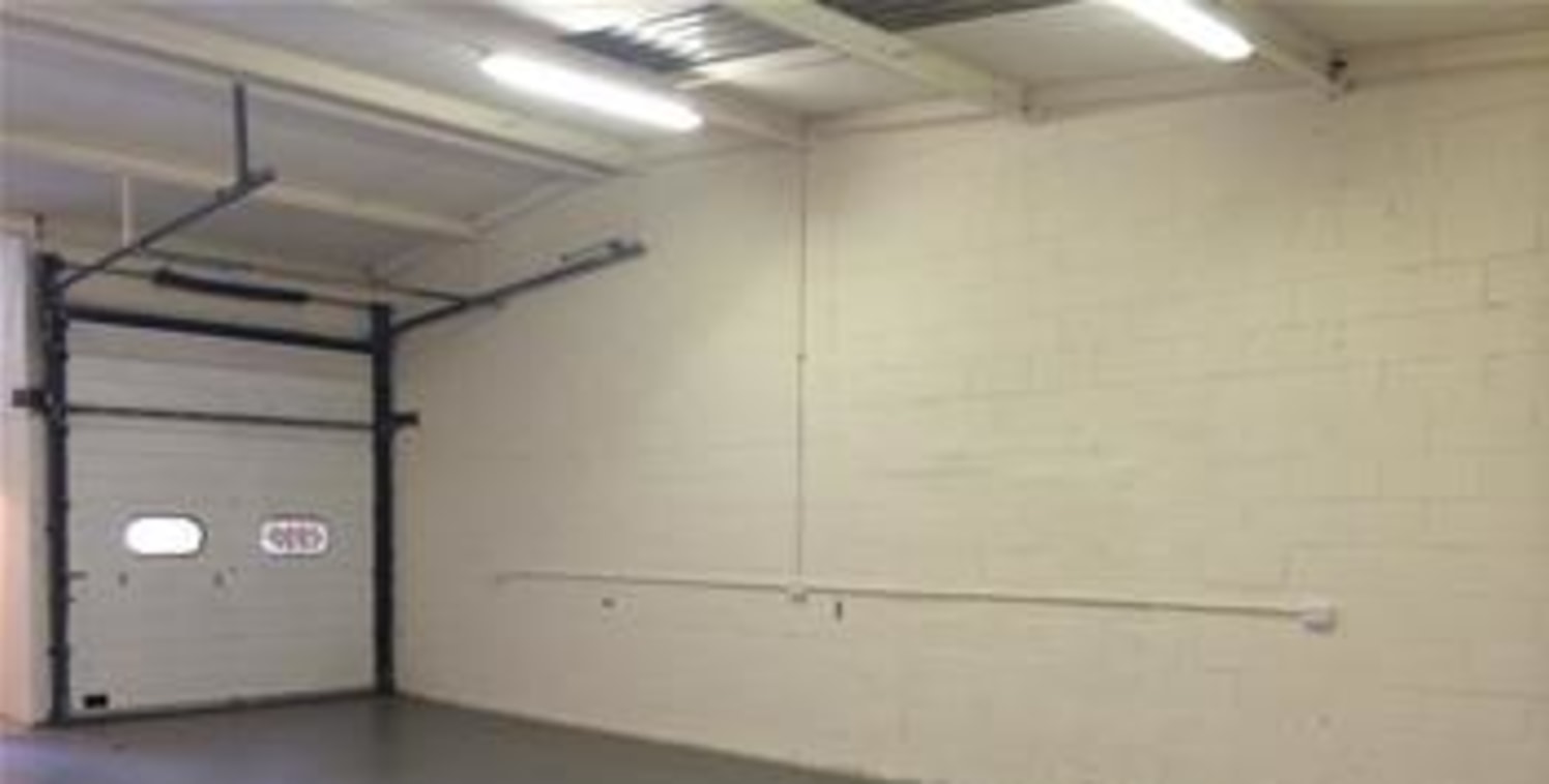 The premises comprise a steel portal frame industrial/warehouse unit of brickwork elevations to a pitched roof. The warehouse benefits from an open plan layout with a small administration office and access is gained via a full height up and over load...